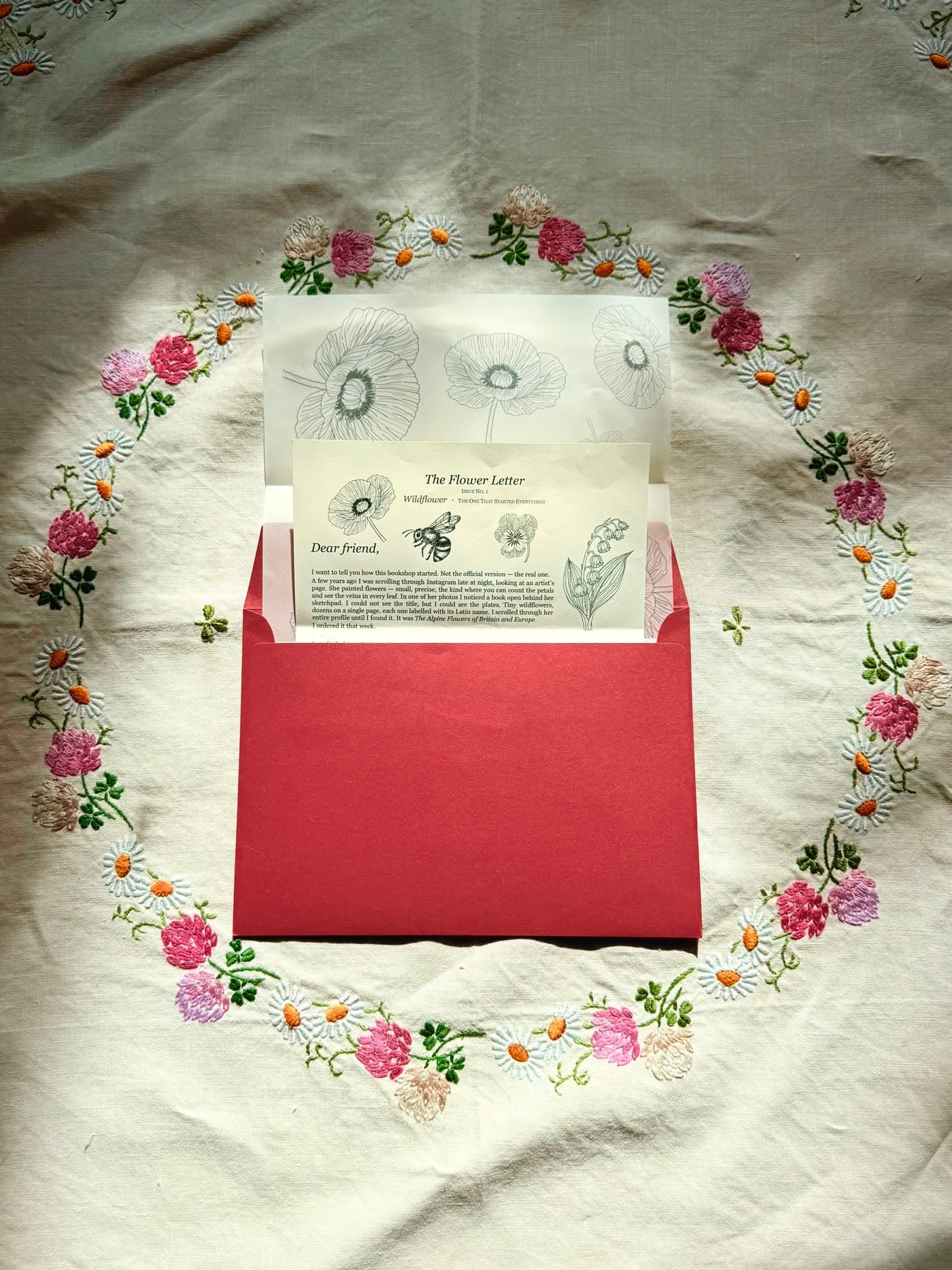 The monthly letter from OBS Books — one folded page, signed and stamped in burgundy ink, tucked into the envelope.